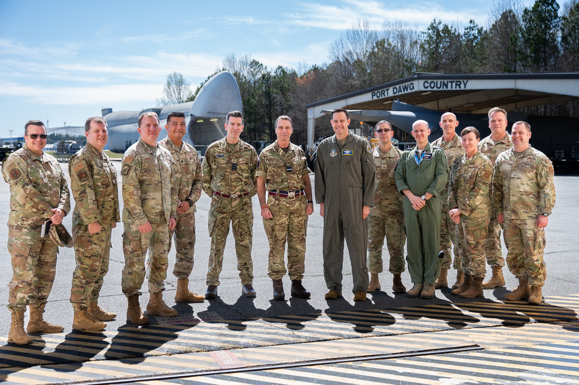 A group of Air Force Reserve and Royal Auxiliary Air Force members join for a group photo.