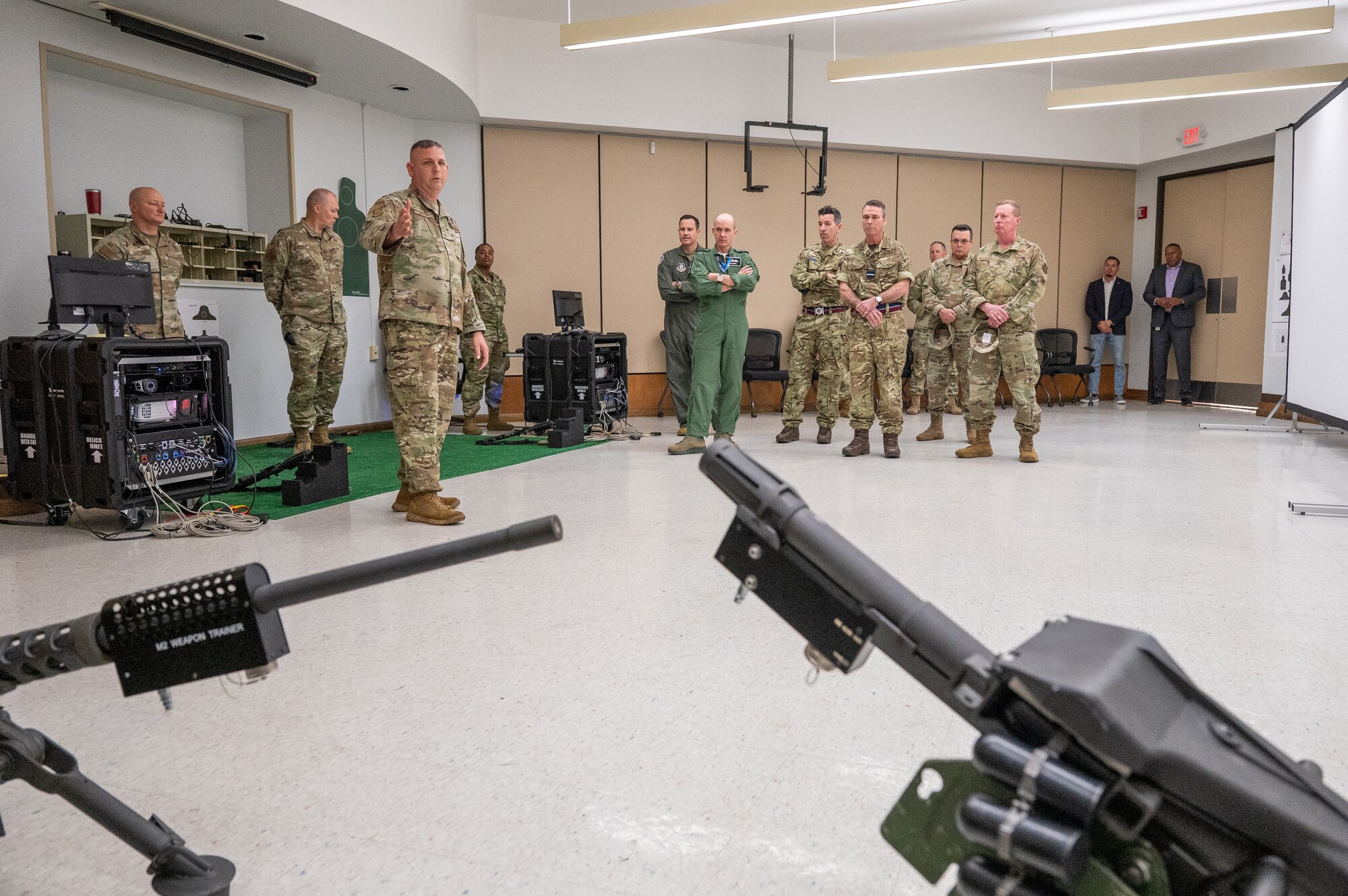 Air Force Reserve security forces instructor speaks to a group about how they train.