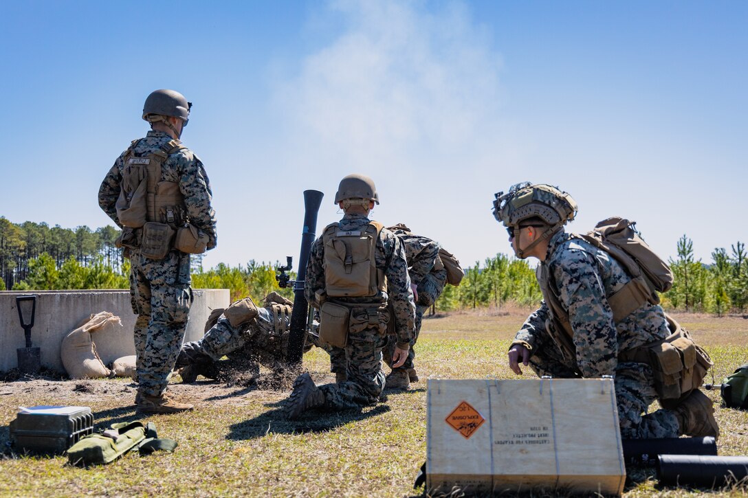 U.S. Marines with Weapons Company, 2nd Battalion, 2nd Marine Regiment, operate M252 81mm mortar systems during a live-fire mortar range at Marine Corps Air Station New River, North Carolina, March 18, 2025. 2nd Battalion, 2nd Marines conducted the mortar range to prepare for potential future missions as the ground combat element of the Special Purpose Marine Air-Ground Task Force – Alert Contingency MAGTF (SPMAGTF-ACM) (U.S. Marine Corps Photo by Lance Cpl. Jack Labrador)