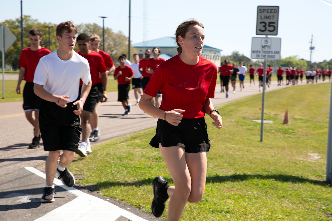 Individuals scheduled for boot camp complete a 1.5-mile run during a Marine Corps Recruiting Station Jacksonville pool function March 22 at Marine Corps Support Facility Blount Island in Jacksonville, Florida. Roughly 275 young men and women from across Florida and Georgia participated in the annual event, designed to assess the physical and mental readiness of future recruits before they ship to boot camp.