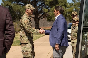 Col. Seth Spanier, 7th Bomb Wing commander, shakes hands with Congressman Jodey Arrington, at Dyess Air Force Base, Texas, March 19, 2025. Arrington visited Dyess to meet with base leadership to discuss a way forward supporting the base infrastructure and the future beddown of the B-21 Raider. (U.S. Air Force photo by Senior Airman Emma Anderson)