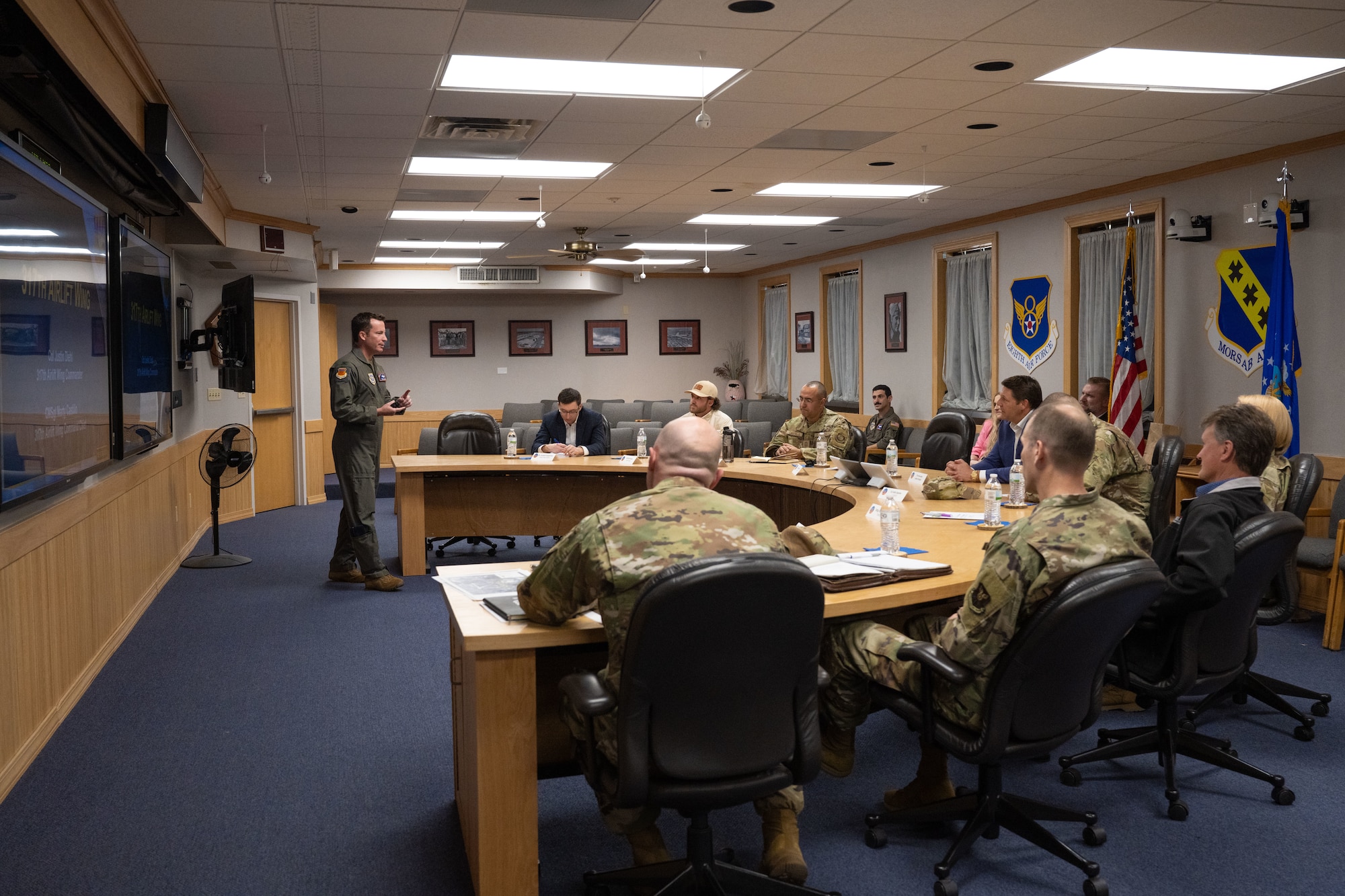 Col. Justin Diehl, 317th Airlift Wing commander, presents a mission brief to Congressman Jodey Arrington, at Dyess Air Force Base, Texas, March 19, 2025. Arrington is the U.S. representative for Texas’s 19th congressional district, which includes a large slice of West Texas, centered around Lubbock and Abilene. (U.S. Air Force photo by Senior Airman Emma Anderson)