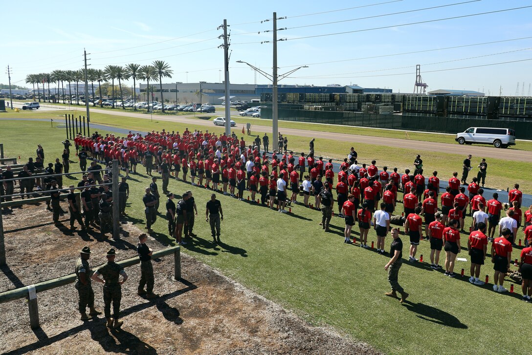 Individuals scheduled for boot camp prepare for a 1.5-mile run during a Marine Corps Recruiting Station Jacksonville pool function March 22 at Marine Corps Support Facility Blount Island in Jacksonville, Florida. Roughly 275 young men and women from across Florida and Georgia participated in the annual event, designed to assess the physical and mental readiness of future recruits before they ship to boot camp.