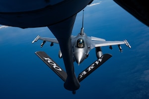 A U.S. Air Force F-16 Fighting Falcon from the 31st Fighter Wing, Aviano Air Base, Italy, approaches a KC-135 Stratotanker from the 100th Air Refueling Wing, RAF Mildenhall, England, for aerial refueling over the Adriatic Sea, March 19, 2025.