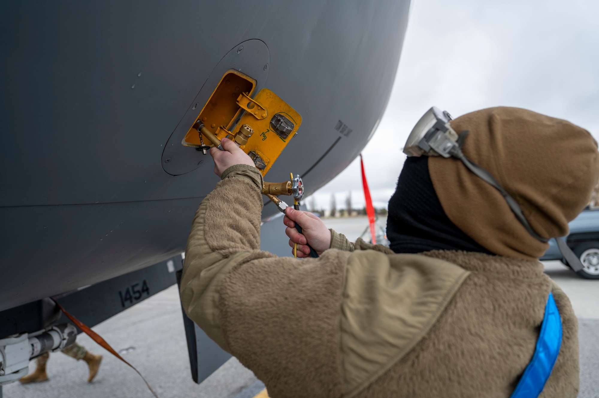 U.S. Air Force Airman 1st Class Jason Cartrette, a crew chief assigned to the 92nd Aircraft Maintenance Squadron, works on the gaseous oxygen system during exercise Titan Fury 25-2 at Fairchild Air Force Base, Washington, March 17, 2025. This emergency life support system ensures pilots can breathe if they experience a loss of cabin pressure. Team Fairchild’s mobility and maintenance crews dedication to responding effectively while generating aircraft is a vital component of adapting to increasingly complex environments and challenges. (U.S. Air Force photo by Airman 1st Class Samantha Thorn)