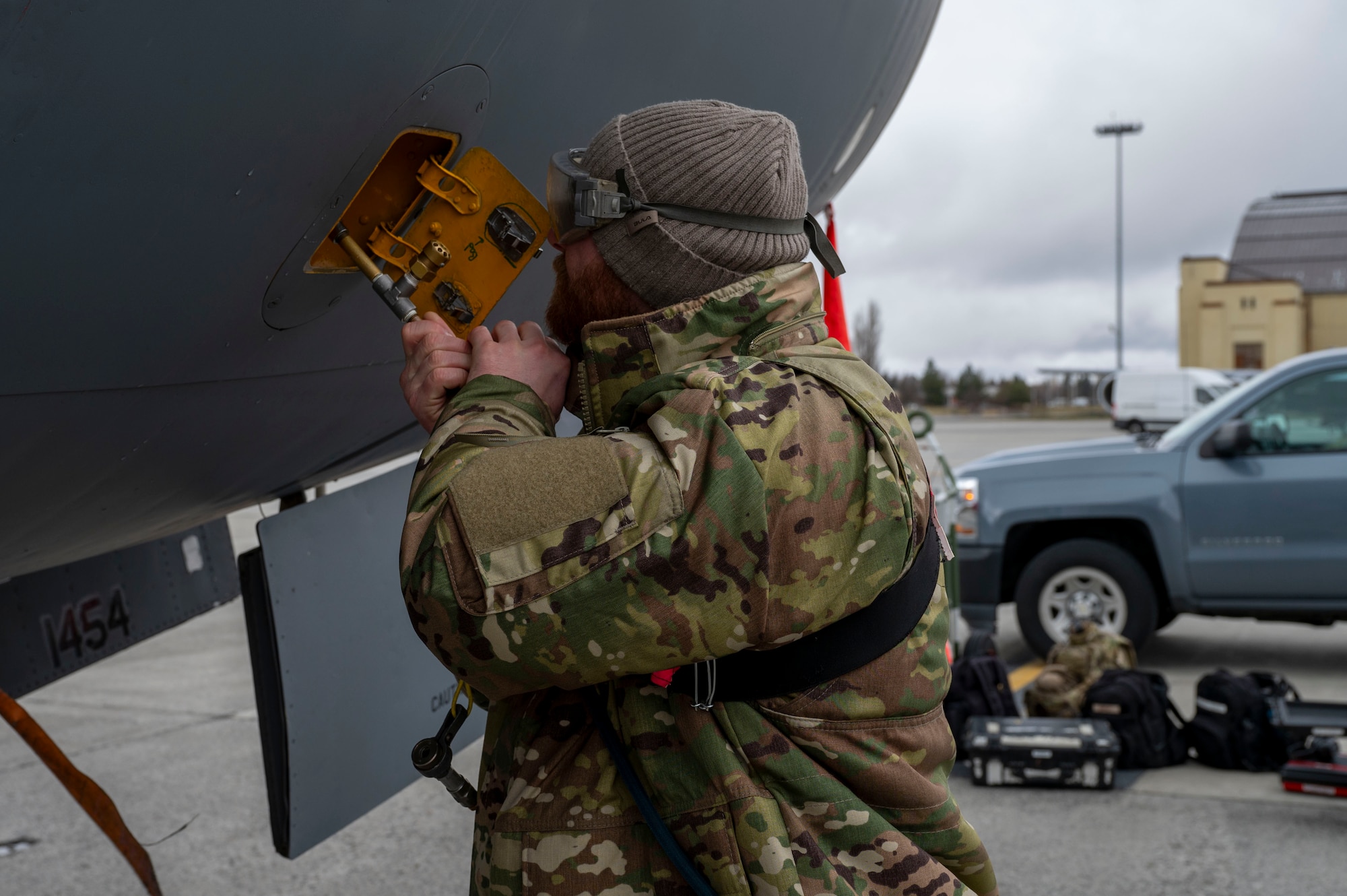 U.S. Air Force Staff Sgt. Garrett Rose, a maintenance organizational trainer assigned to the 92nd Maintenance Squadron, pressurizes the gaseous oxygen system during exercise Titan Fury 25-2 at Fairchild Air Force Base, Washington, March 17, 2025. The gaseous oxygen system helps aircrew to breathe in case they lose oxygen, it serves as another form of emergency life support. Titan Fury is a total force readiness exercise designed to evaluate and enhance the operational skills of Team Fairchild’s Airmen, ensuring their ability to fuel today and tomorrow’s fight. (U.S. Air Force photo by Airman 1st Class Samantha Thorn)