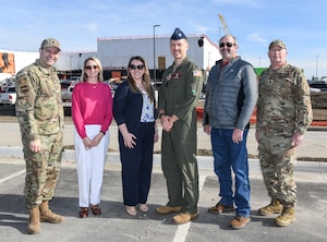 Lt. Col. Ryan Davis, 55th Mission Support Group deputy commander, Tammi Palm, City of Bellevue planning director, Krista Hoffart, 55th Civil Engineering Squadron Portfolio Optimization chief, Capt. Jay Hamman, 55th Wing Project Management Office, David Goedeken, City of Bellevue public works director, and Lt. Col. John Brindle, Air Force Civil Engineer Center Natural Disaster Recovery division branch chief pose for a photo at the flood recovery construction site on Offutt Air Force Base, March 10, 2025. Offutt and Bellevue work hand in hand on numerous projects to strengthen community relations.