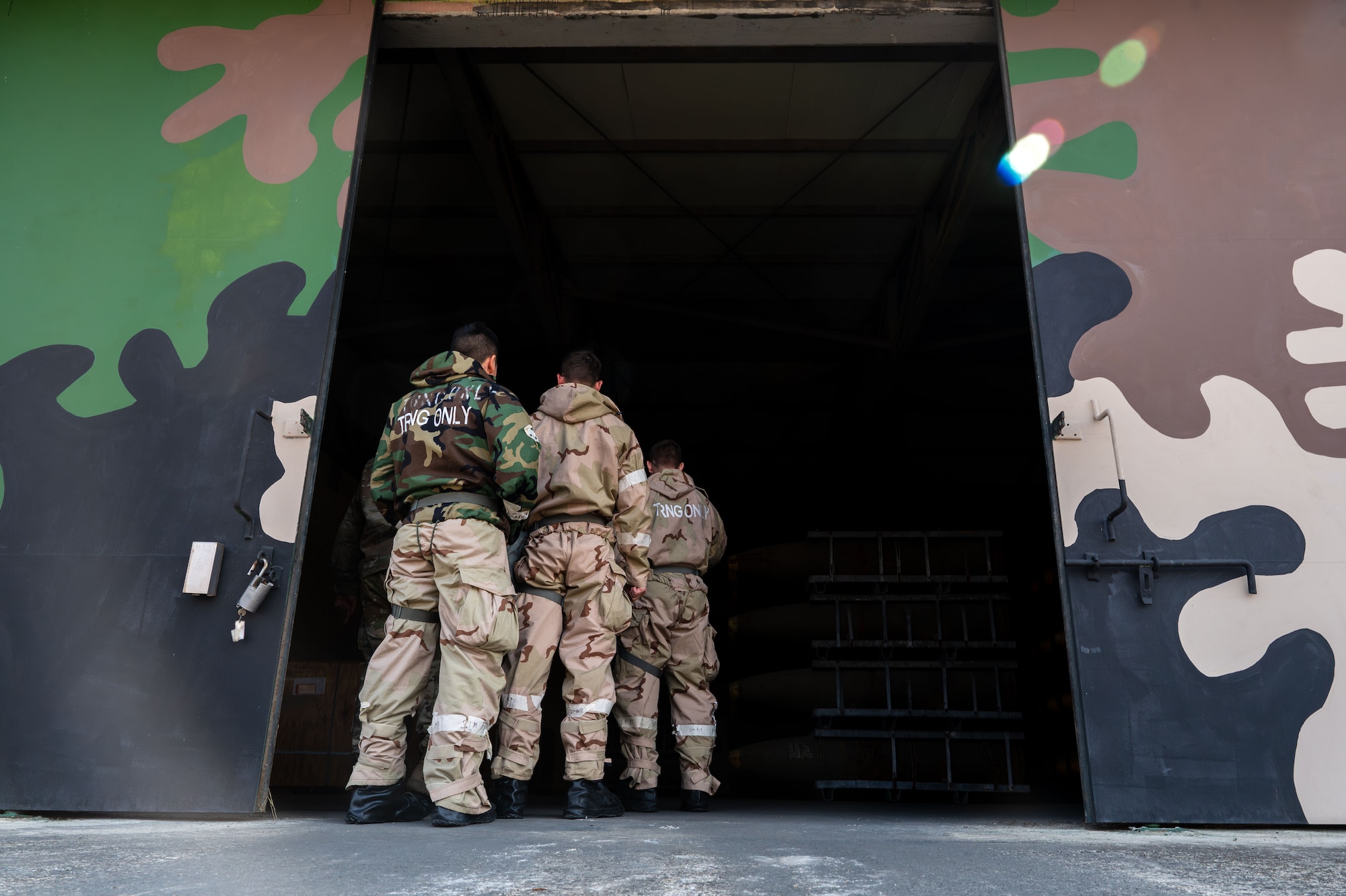 U.S. Airmen assigned to the 11th Air Task Force enter a munition storage facility in support of Freedom Shield 25 at Suwon Air Base, South Korea, March 11, 2025. U.S. and Republic of Korea ammo personnel executed munitions storage procedures to guarantee safe handling, efficient organization and quick accessibility for potential operations. (U.S. Air Force photo by Senior Airman Jasmyne Bridgers-Matos)