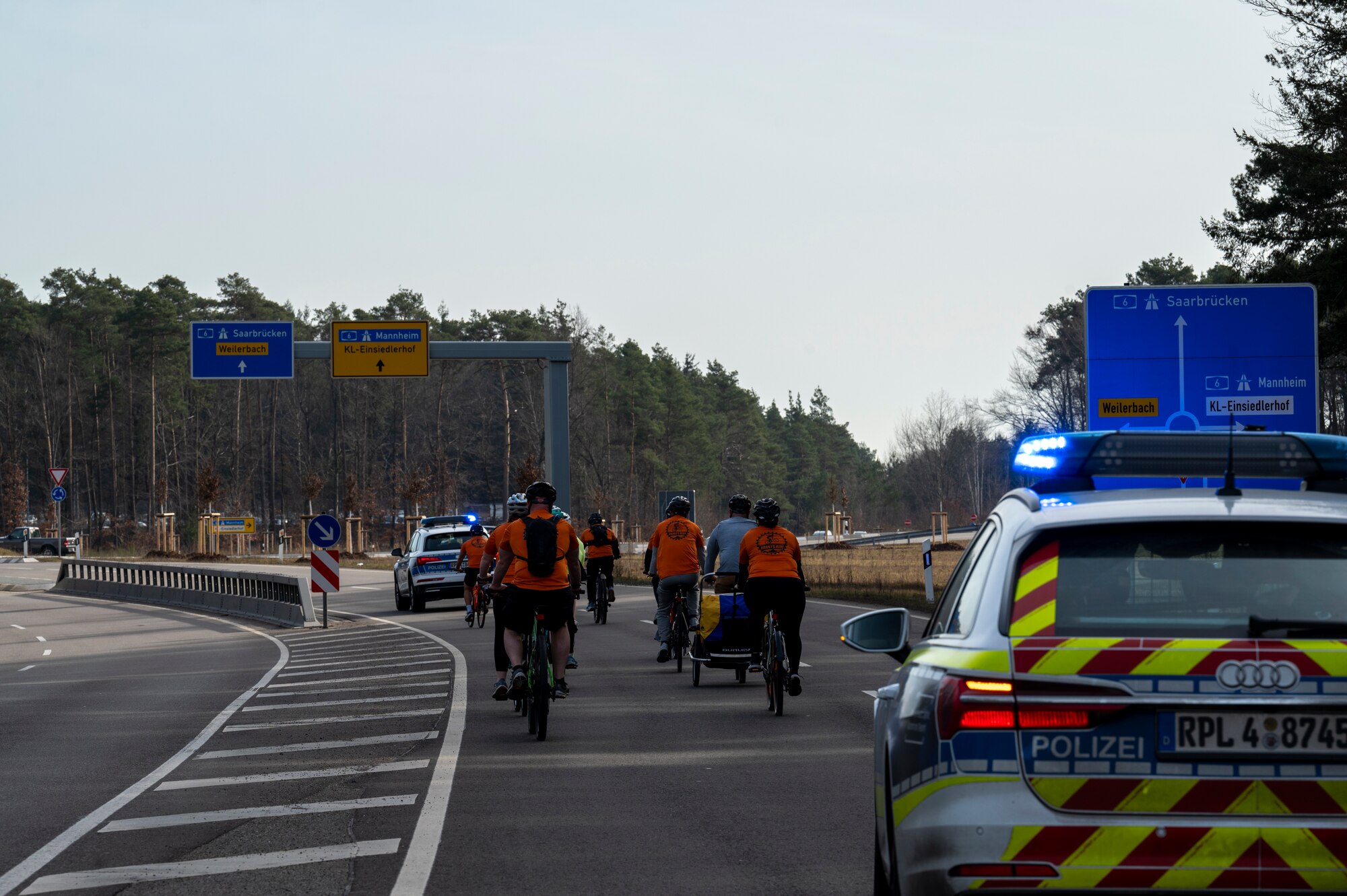 Participants of Grant’s Ride cycle to a roadside memorial near Ramstein Air Base, Germany March 21, 2025.