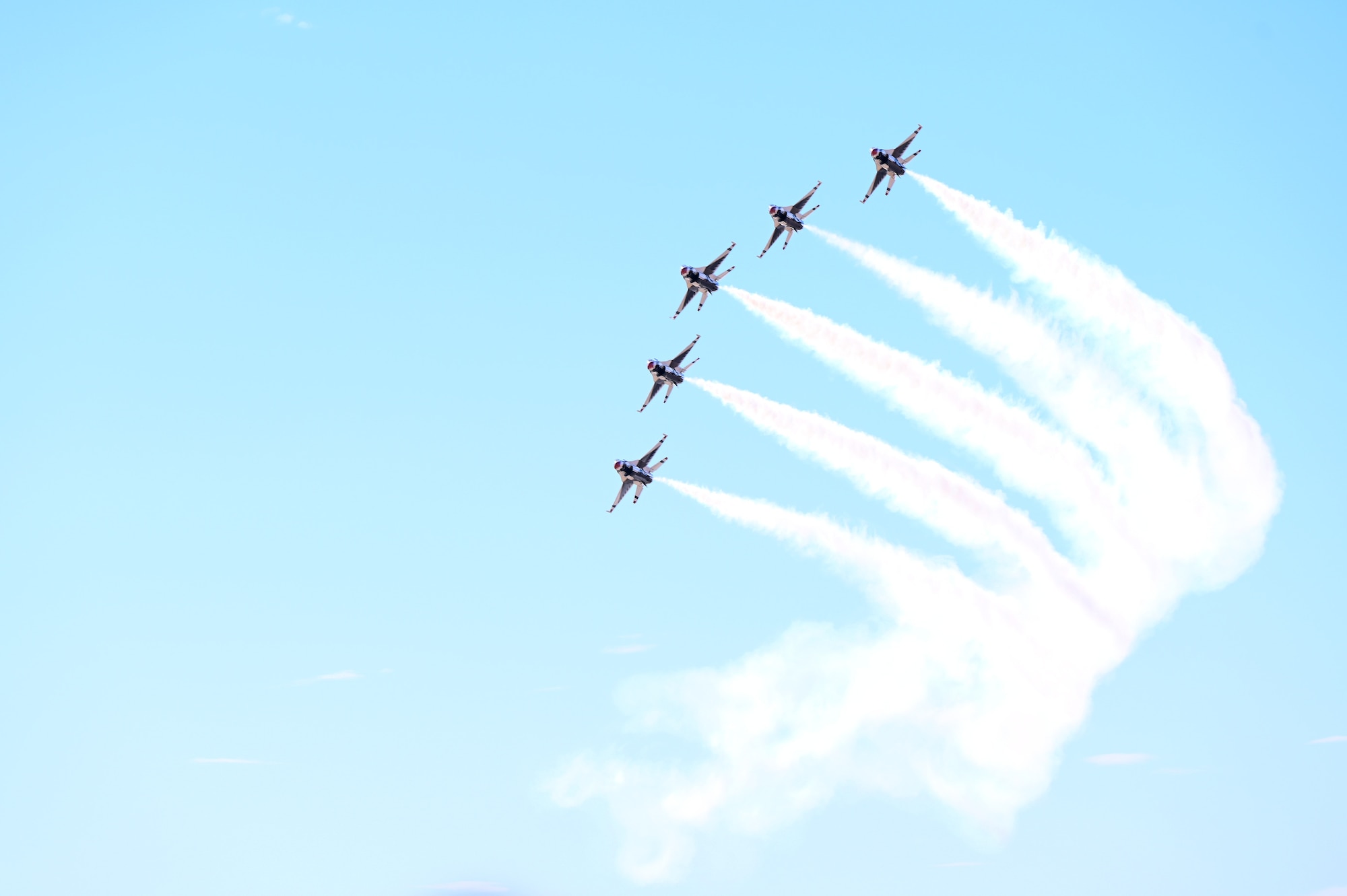 The United States Air Force Air Demonstration Squadron "Thunderbirds” fly in formation during the Thunder and Lightning Over Arizona Air Show at Davis-Monthan Air Force Base, Arizona, March 23, 2025.  The air show was open to the public as a way to connect the base and local community while also highlighting the mission and capabilities of the USAF. (U.S. Air Force photo by Senior Airman Andrew Garavito)