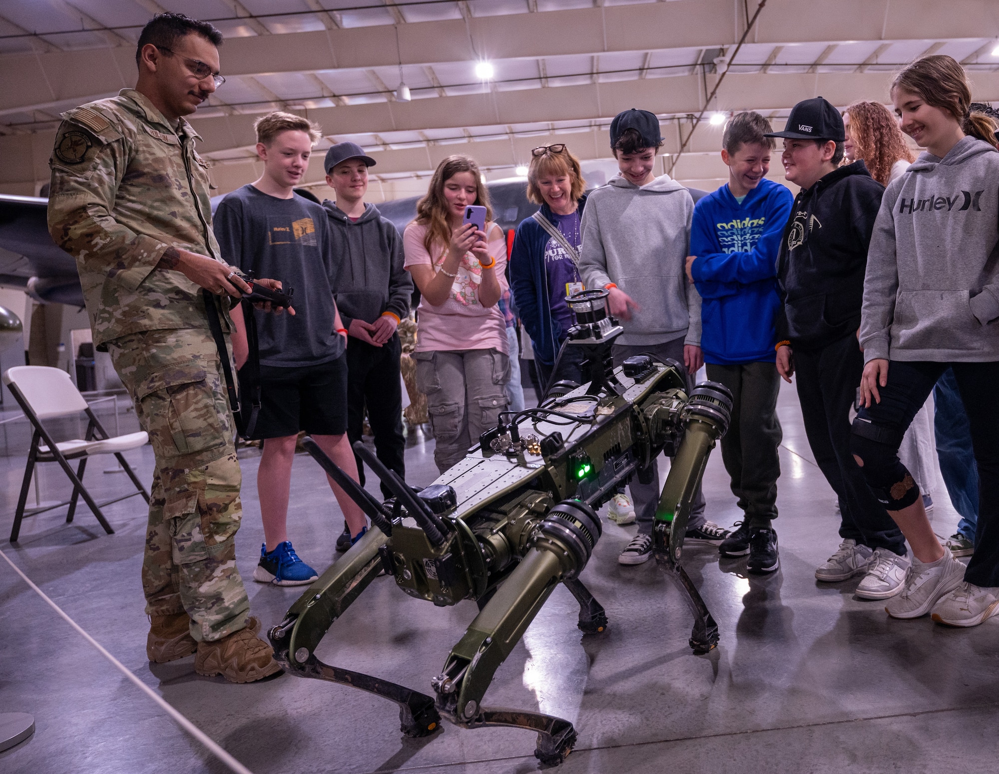 A photo of students interacting with Airmen