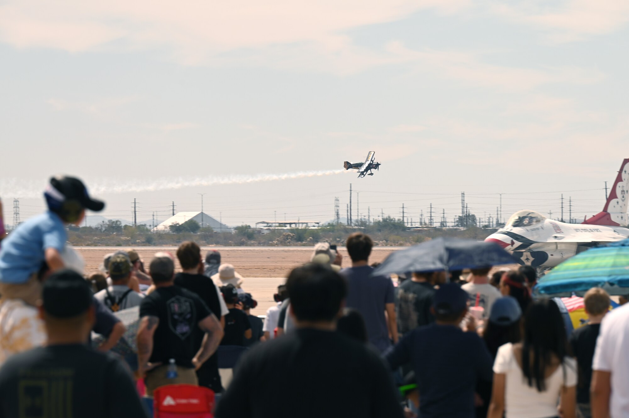 A civilian performer flies over Davis-Monthan Air Force Base, Arizona, March 23, 2025. Civilian performers were part of the Thunder and Lightning Over Arizona Air Show, which also included The United States Air Force Air Demonstration Squadron “Thunderbirds” and the F-35A Lightning II Demonstration Team. (U.S. Air Force photo by Airman Jaden Kidd)