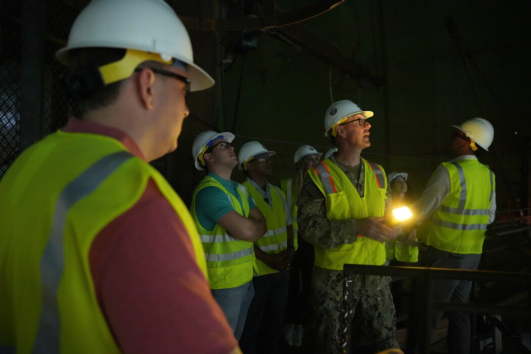 Capt. Steven Stasick, facilities director, Navy Closure Task Force-Red Hill (NCTF-RH), observes tank 19 with Lee Zeldin 17th administrator, U.S. Environmental Protection Agency, during a site visit to the Red Hill Bulk Fuel Storage Facility (RHBFSF) in Honolulu, March 22, 2025. Charged with the safe decommissioning of the facility, NCTF-RH was established by the Department of the Navy as a commitment to the community and the environment, and continues to engage with the people of Hawaii, regulatory agencies, and other stakeholders as it safely and deliberately decommissions the RHBFSF. (U.S. Navy photo by Mass Communication Specialist Seaman Krystal Diaz)