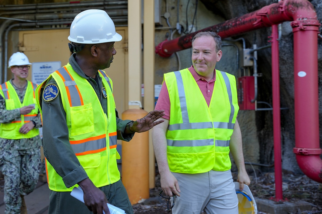 Rear Adm. Stephen Barnett, commander, Navy Closure Task Force-Red Hill (NCTF-RH) speaks with Lee Zeldin, 17th administrator, U.S. Environmental Protection Agency, as they exit the Red Hill Bulk Fuel Storage Facility (RHBFSF) in Honolulu, March 22, 2025. Charged with the safe decommissioning of the facility, NCTF-RH was established by the Department of the Navy as a commitment to the community and the environment, and continues to engage with the people of Hawaii, regulatory agencies, and other stakeholders as it safely and deliberately decommissions the RHBFSF. (U.S. Navy photo by Mass Communication Specialist Seaman Krystal Diaz) (This photo has been altered for security purposes.)