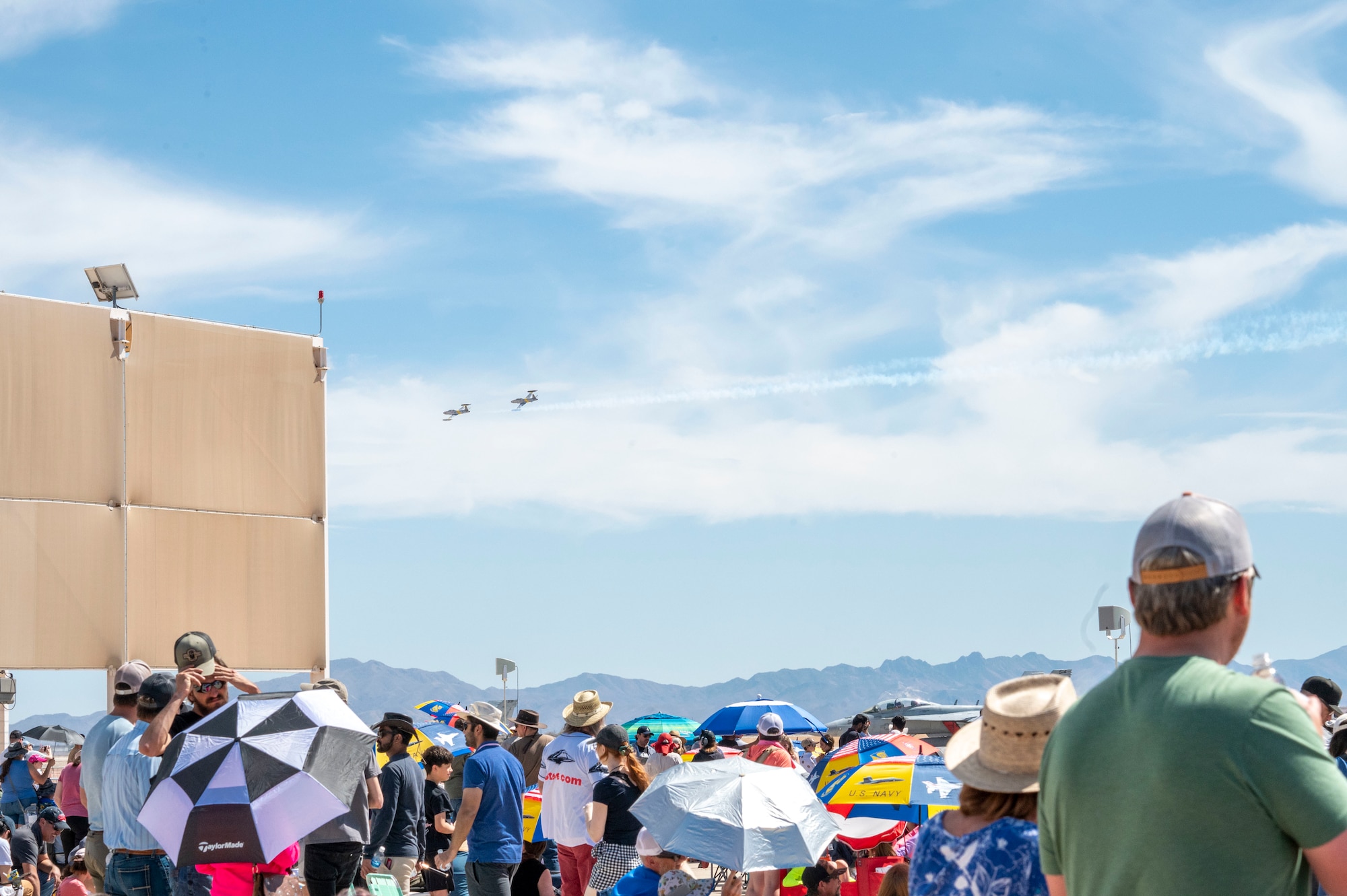 Two T33 Shooting Star aircraft fly during the 2025 Thunder and Lightning Over Arizona Air Show at Davis-Monthan Air Force Base, Arizona, March 23, 2025. The biannual air show offered guests the opportunity to tour more than 40 static displays and watch 15 aerial performances. (U.S. Air Force photo by Airman Samantha Melecio)
