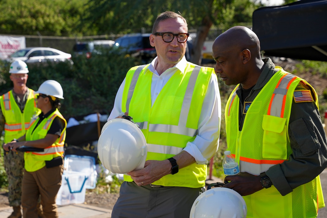 Rear Adm. Stephen Barnett, commander, Navy Closure Task Force-Red Hill (NCTF-RH) speaks with Josh Cook, Region 9 administrator, U.S. Environmental Protection Agency, during a site visit to the Red Hill Bulk Fuel Storage Facility (RHBFSF) in Honolulu, March 22, 2025. Charged with the safe decommissioning of the facility, NCTF-RH was established by the Department of the Navy as a commitment to the community and the environment, and continues to engage with the people of Hawaii, regulatory agencies, and other stakeholders as it safely and deliberately decommissions the RHBFSF. (U.S. Navy photo by Mass Communication Specialist Seaman Krystal Diaz)