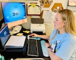 Federal employee Rachel Milnark, a registered nurse at Munson Army Health Center, Fort Leavenworth, Kansas, logs in to virtual healthcare delivery platform,  Scheduled Virtual Visits, March 12. The virtual healthcare technology is part of the Defense Health Agency care model called My Military Health.