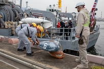 KOBE, Japan (March, 24 2025) – USS Warrior pulls into port at Kobe, Japan. USS Warrior, part of Mine Counter Measures Squadron 7, is operating in the U.S. 7th Fleet area of operations.