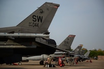 U.S. Air Force Senior Airman Joshua Roberts, an F-16 Fighting Falcon crew chief assigned to the 77th Expeditionary Fighter Generation Squadron, reviews aircraft maintenance records during exercise Cope Tiger 25 at Korat Royal Air Base, Thailand, Mar. 17, 2025.