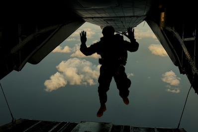 OKINAWA, Japan (March 20, 2025) — A U.S. Marine with Force Reconnaissance Platoon, Maritime Raid Force, 31st Marine Expeditionary Unit, jumps from a U.S. Marine Corps MV-22B Osprey assigned to Marine Medium Tiltrotor Squadron 262 (Rein.), during parachute operations for a Reconnaissance and Surveillance exercise at Ie Shima Training Facility, Okinawa, Japan, Mar. 20, 2025. The Marines participated in day parachute operations to sustain their aerial insertion skills and enhance their low visibility capabilities. The 31st MEU, the Marine Corps’ only continuously forward-deployed MEU, provides a flexible and lethal force, ready to perform a wide range of military operations as the premiere crisis response force in the Indo-Pacific region. (U.S. Marine Corps photo by Lance Cpl. Skilah Sanchez)