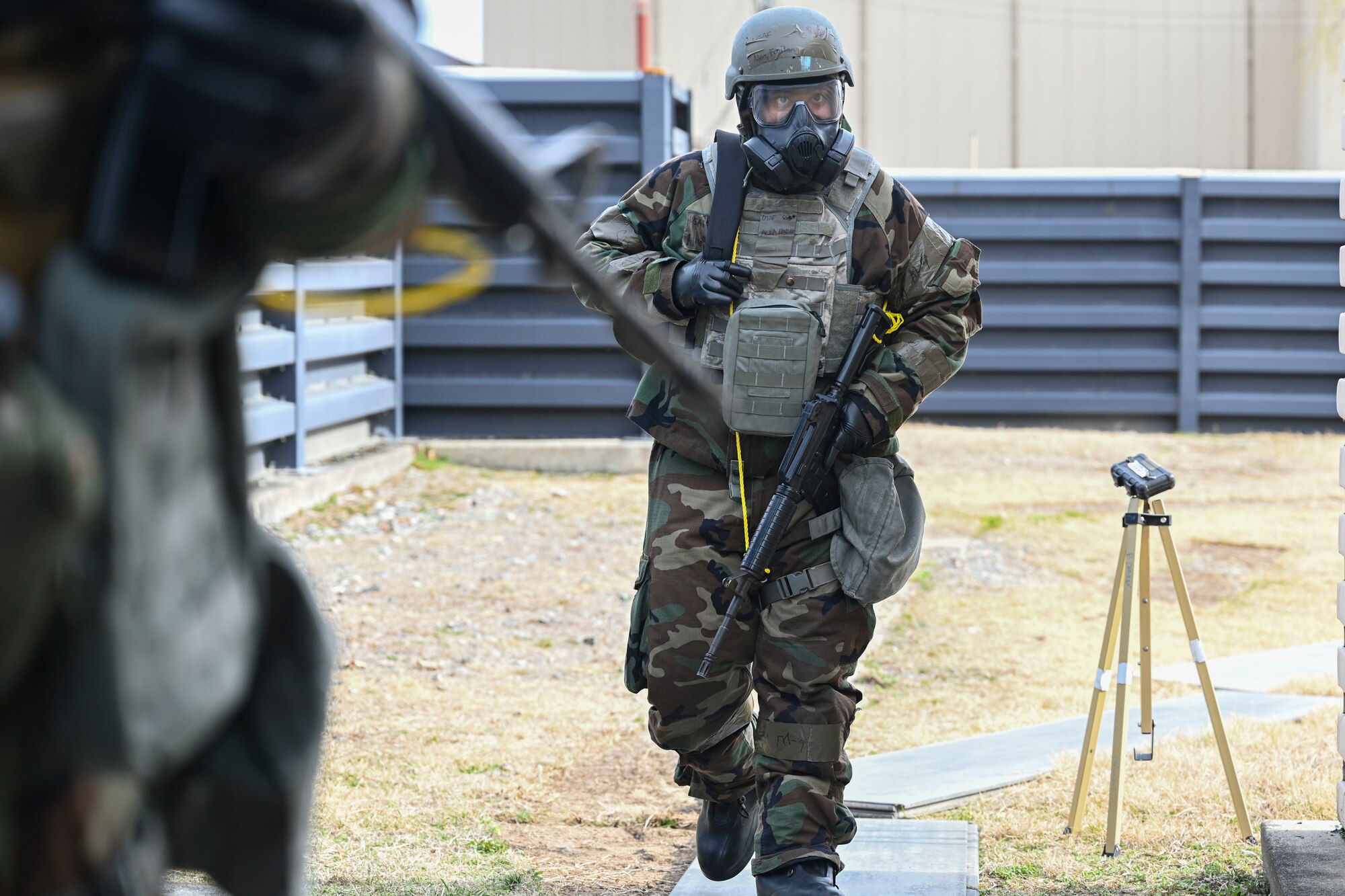 U.S. Air Force Staff Sgt. Froilan Alea, 8th Logistic Readiness Squadron traffic management office outbound cargo, conducts a post-attack reconnaissance sweep during Freedom Shield 25 at Gwangju Air Base, Republic of Korea.
