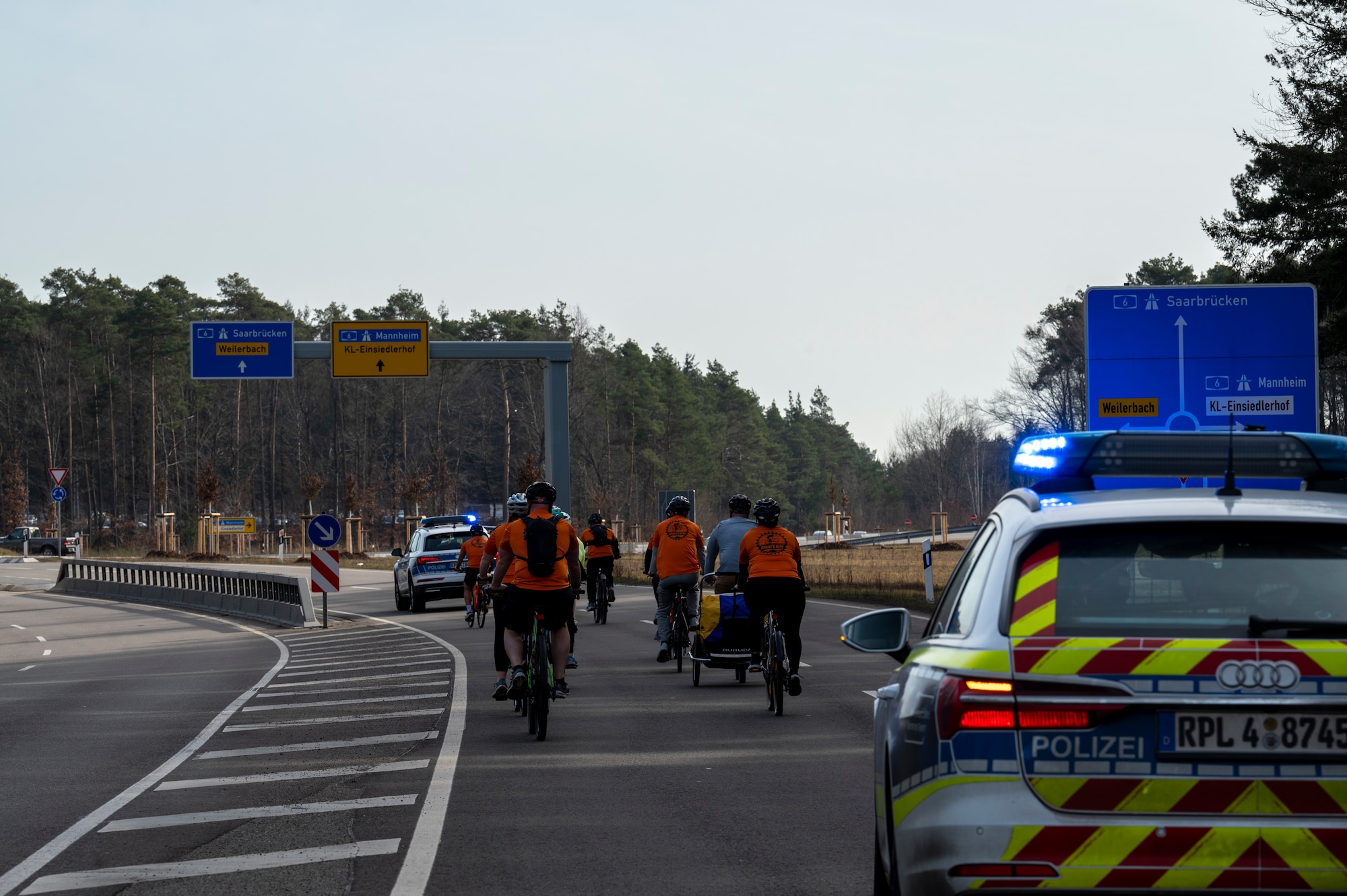 Participants of Grant’s Ride cycle to a roadside memorial near Ramstein Air Base, Germany March 21, 2025.