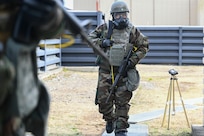 U.S. Air Force Staff Sgt. Froilan Alea, 8th Logistic Readiness Squadron traffic management office outbound cargo, conducts a post-attack reconnaissance sweep during Freedom Shield 25 at Gwangju Air Base, Republic of Korea.