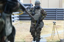 U.S. Air Force Staff Sgt. Froilan Alea, 8th Logistic Readiness Squadron traffic management office outbound cargo, conducts a post-attack reconnaissance sweep during Freedom Shield 25 at Gwangju Air Base, Republic of Korea.