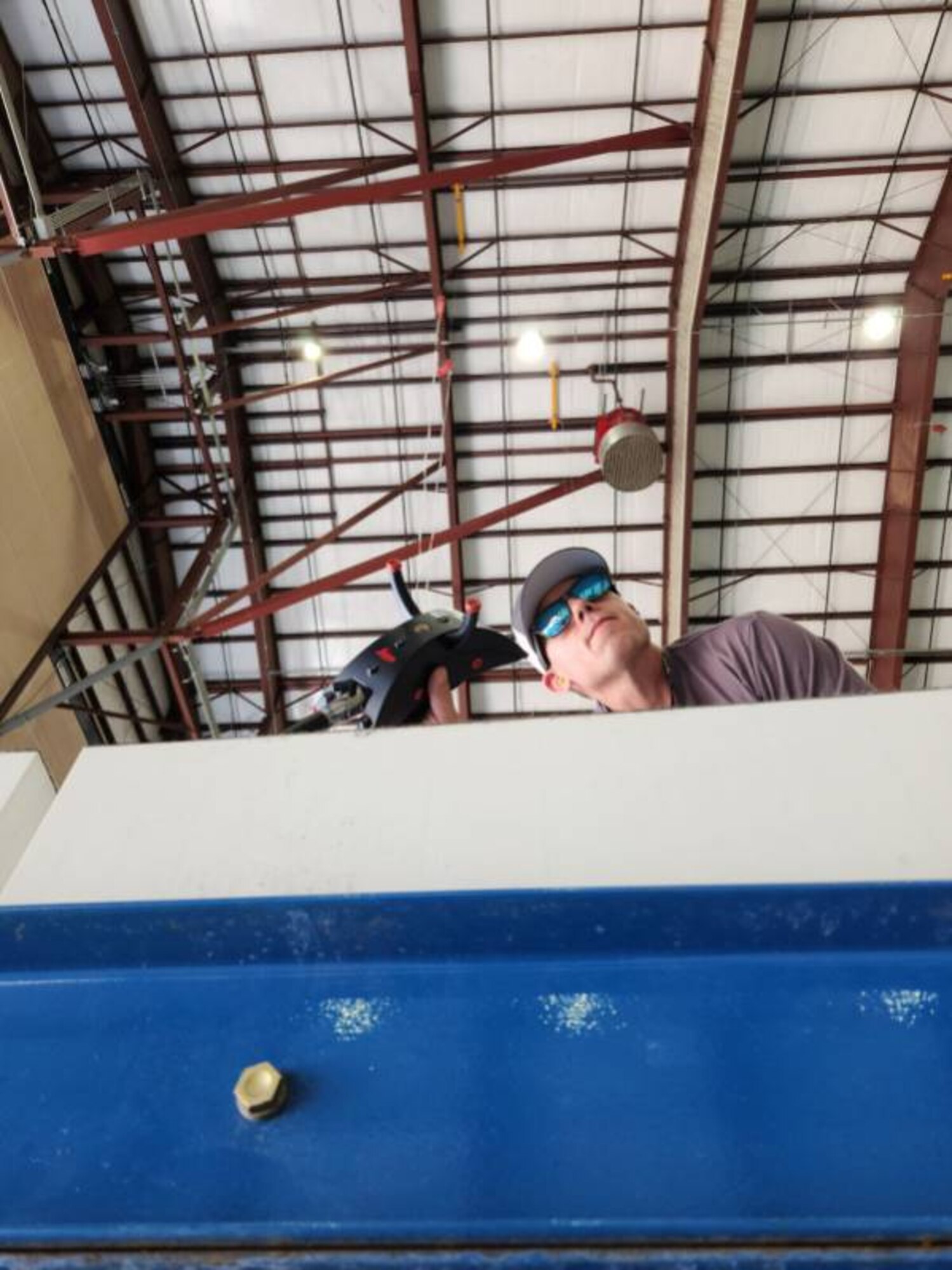 A man working on an aircraft.