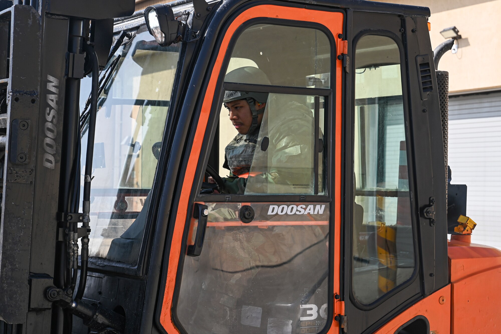 Senior Airman Fabian Laguna, 8th Maintenance Squadron munitions inspector, drives a loader to transport a training munition during Freedom Shield 25 at Kunsan Air Base, Republic of Korea.