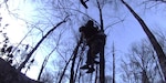 Sgt. 1st Class John Sharbel, with the Tennessee Army National Guard, and an injured hiker are hoisted into a hovering UH-60 Black Hawk helicopter in the Great Smoky Mountains National Park, March 22, 2025.