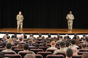 U.S. Air Force Col. D. Landon Phillips, 501st Combat Support Wing (CSW) commander and Chief Master Sgt. Terrance Boyd, 501st CSW command chief, speak during an all call