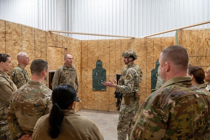 Group of people standing in shoot house