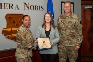 Breana Quimby, 42nd Operational Medical Readiness Squadron environmental health technician, received the Crusader of the Month award for the month of March from U.S. Air Force Col. Shamekia Toliver, 42nd Air Base Wing commander, and Chief Master Sgt. Caleb Vaden, 42nd ABW command chief, at Maxwell Air Force Base, Alabama, March 20, 2025.