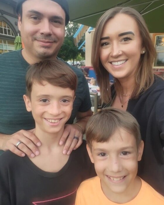 Breana Quimby, 42nd Operational Medical Readiness Squadron environmental health technician, poses for a family photo in Birmingham, Alabama, in July 2023.