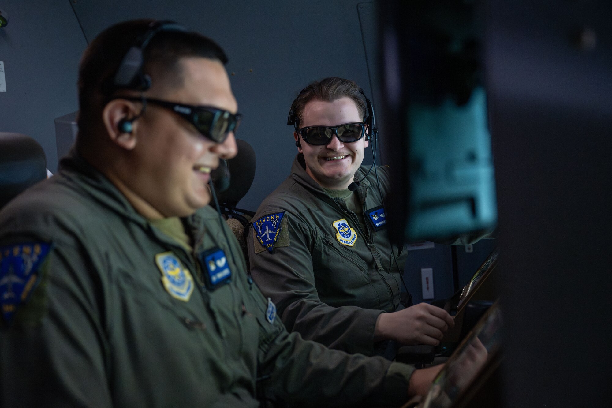 From left, Senior Airman Trinidad Reyes and Senior Airman Brandon McDowell, 344th Air Refueling Squadron boom operators, wait to refuel F-16 Fighting Falcons assigned to the 31 Fighter Wing, from inside a KC-46A Pegasus during exercise Fighting Wyvern 25-01 at Aviano Air Base, March 11, 2025. The 22nd Air Refueling Wing delivered approximately 200 thousand pounds of fuel to 73 receiving aircraft during Fighting Wyvern. (U.S. Air Force photo by Airman 1st Class Paula Arce)