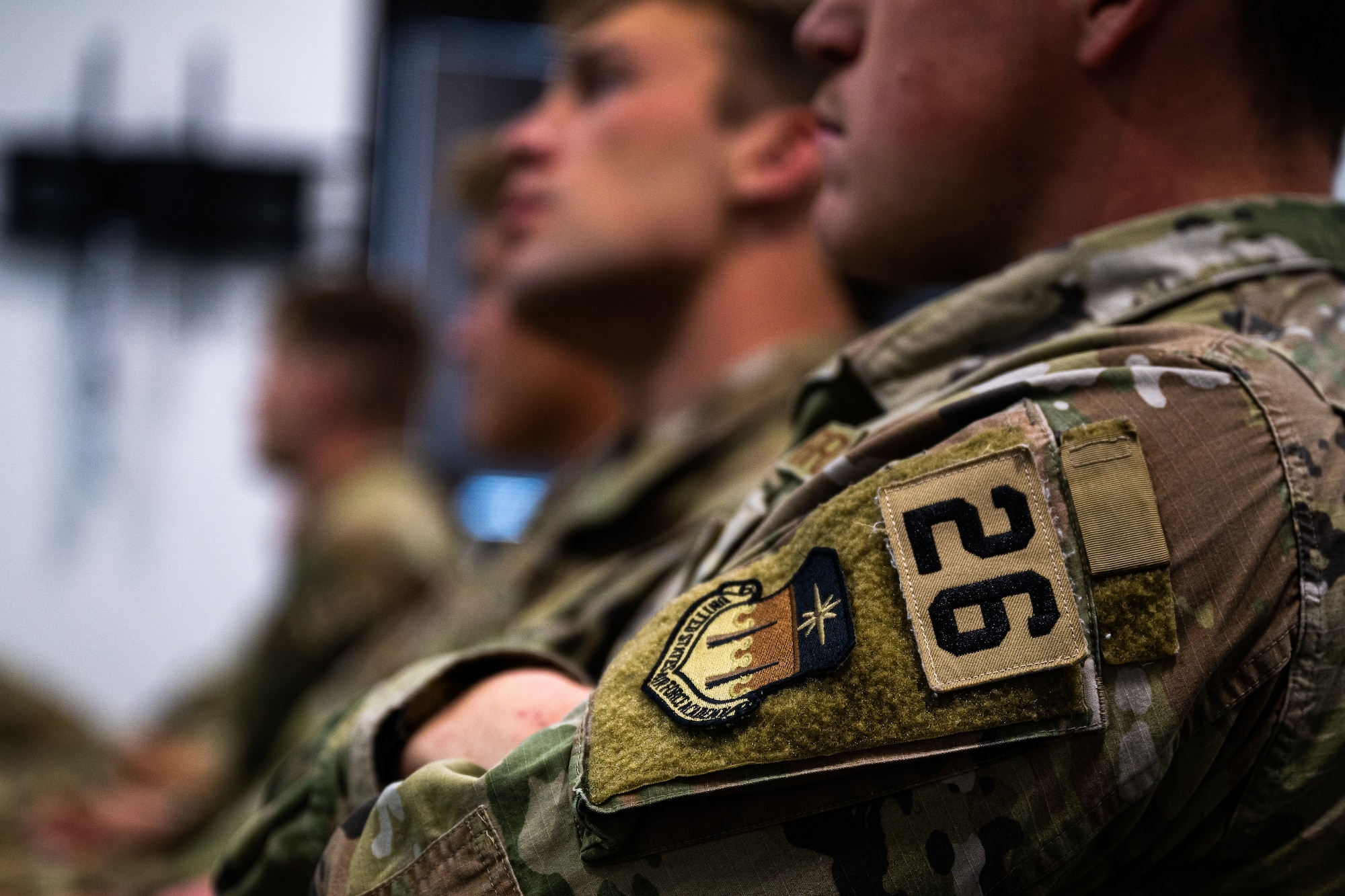 Cadets from the United States Air Force Academy rugby team receive a mission brief on the 57th Rescue Squadron during a tour at Aviano Air Base, Italy, March 21, 2025.