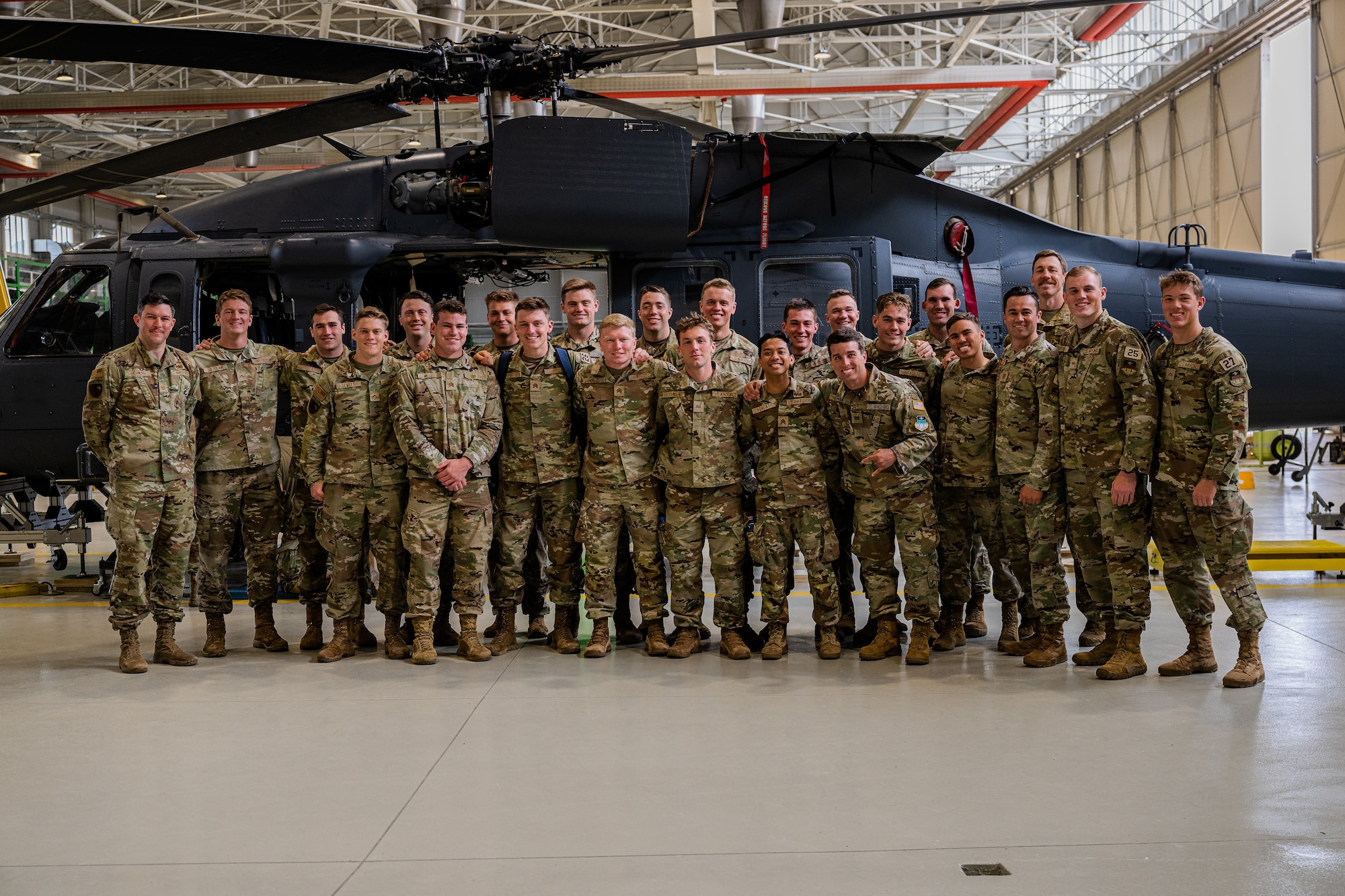 Cadets from the United States Air Force Academy rugby team learn about flight equipment during a tour at Aviano Air Base, Italy, March 21, 2025.