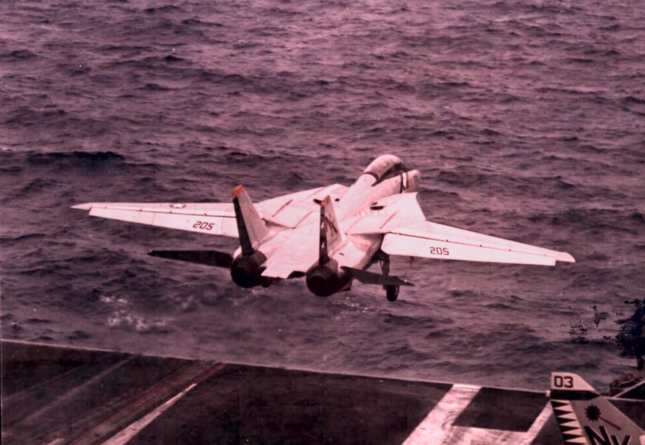 A jet takes off from an aircraft carrier.
