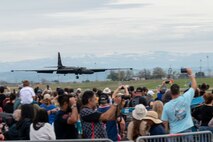 A crowd at the California Capital Airshow watches as U-2 “Dragon Lady” from Beale  approaches to perform a touch-and-go landing, Mather, California, March 22, 2025.