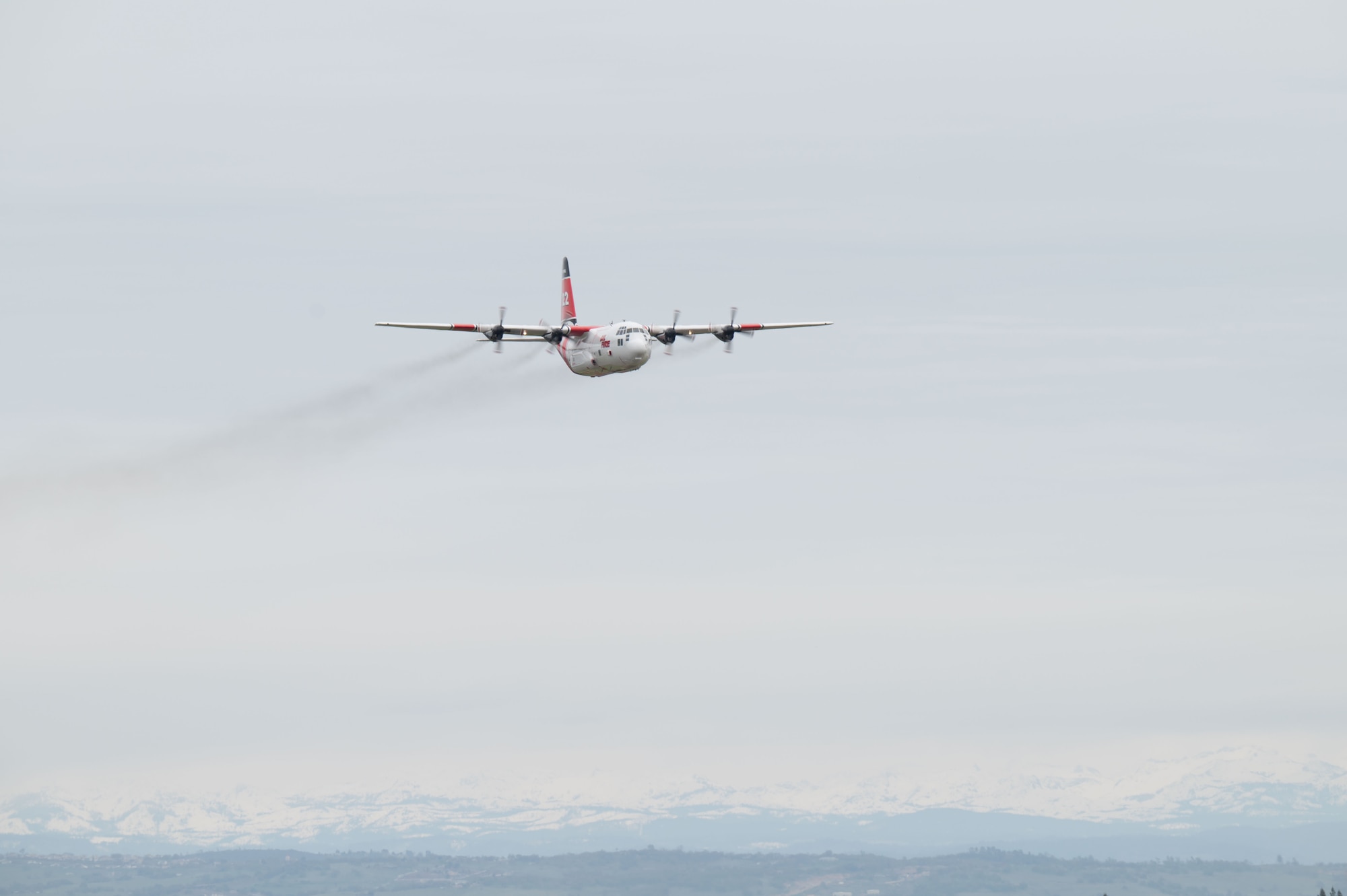 A C-130H Hercules operated by the California Department of Forestry and Fire Protection (CAL FIRE) performs at the California Capital Airshow, Mather, California, March 23, 2025.