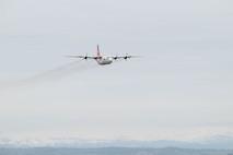A C-130H Hercules operated by the California Department of Forestry and Fire Protection (CAL FIRE) performs at the California Capital Airshow, Mather, California, March 23, 2025.