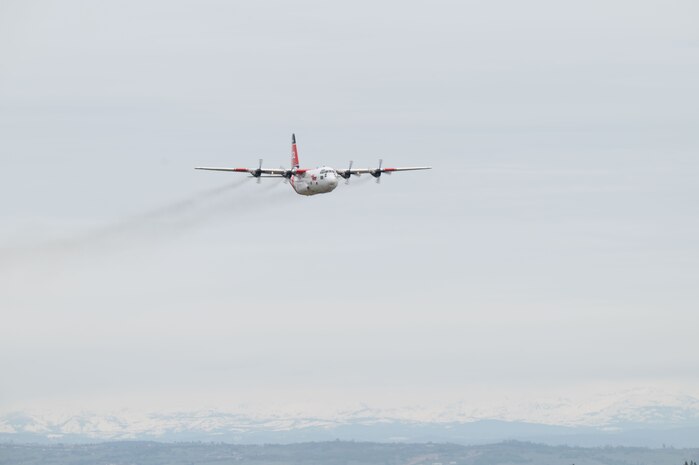 A C-130H Hercules operated by the California Department of Forestry and Fire Protection (CAL FIRE) performs at the California Capital Airshow, Mather, California, March 23, 2025.