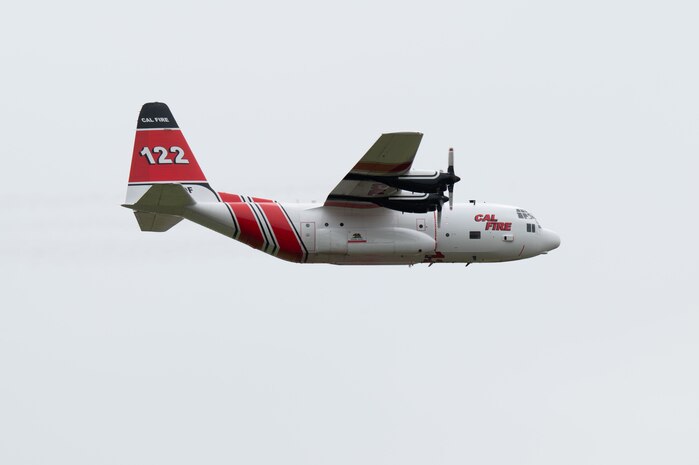 A C-130H Hercules operated by the California Department of Forestry and Fire Protection (CAL FIRE) performs at the California Capital Airshow, Mather, California, March 23, 2025.
