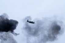 A General Motors produced TBM Avenger torpedo bomber flies through smoke from pyrotechnic displays at the California Capital Airshow, Mather California, March 22, 2025.