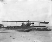 The first radio-controlled plane was an open cockpit, amphibious biplane. Its first totally unmanned flight took place September 15, 1924 (NSWCDD photo by Morgan Tabor).