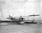 The first radio-controlled plane was an open cockpit, amphibious biplane. Its first totally unmanned flight took place September 15, 1924 (NSWCDD photo by Morgan Tabor).
