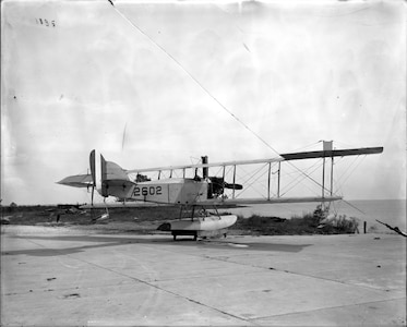 The first radio-controlled plane was an open cockpit, amphibious biplane. Its first totally unmanned flight took place September 15, 1924 (NSWCDD photo by Morgan Tabor).