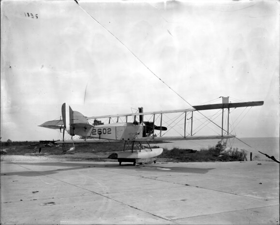 The first radio-controlled plane was an open cockpit, amphibious biplane. Its first totally unmanned flight took place September 15, 1924 (NSWCDD photo by Morgan Tabor).