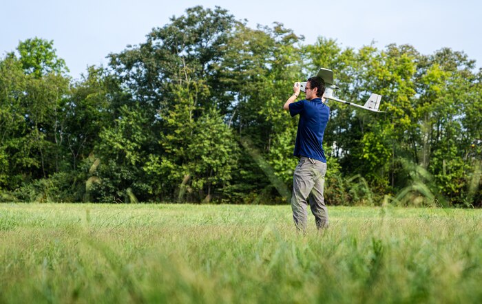 Naval Surface Warfare Center Dahlgren Division Potomac River Test Range Operations Branch team tested a fixed wing unmanned aerial vehicle to support the testing of an optical tracking system (NSWCDD photo by Morgan Tabor).